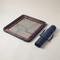The Rebound Frame folded flat beside its carry bag